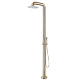 Brushed gold outdoor shower with circular head and handheld attachment.