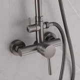 Close-up of gunmetal gray shower mixer valve with temperature and water flow control